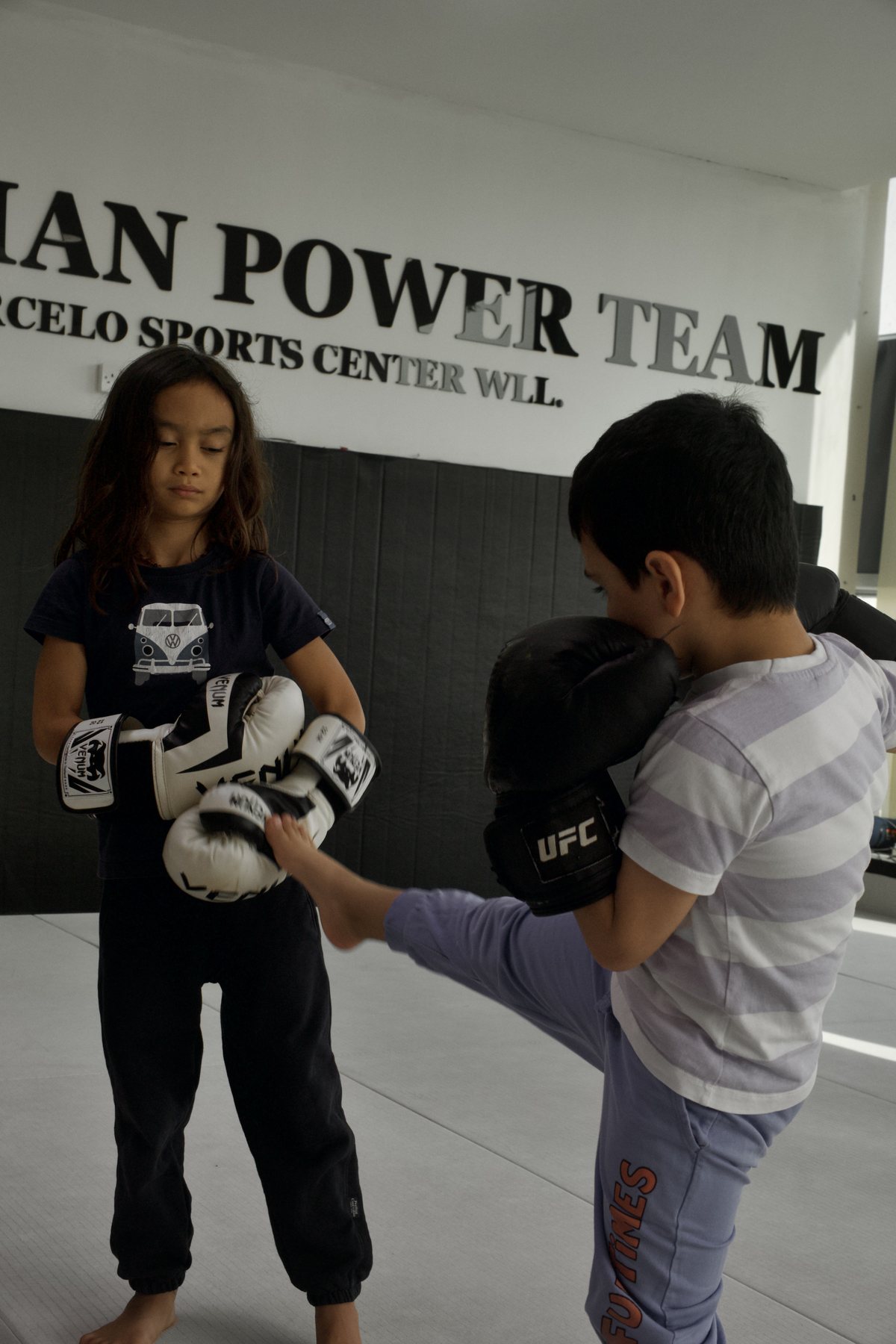 Kids kickboxing pad work at Brazilian Power Team